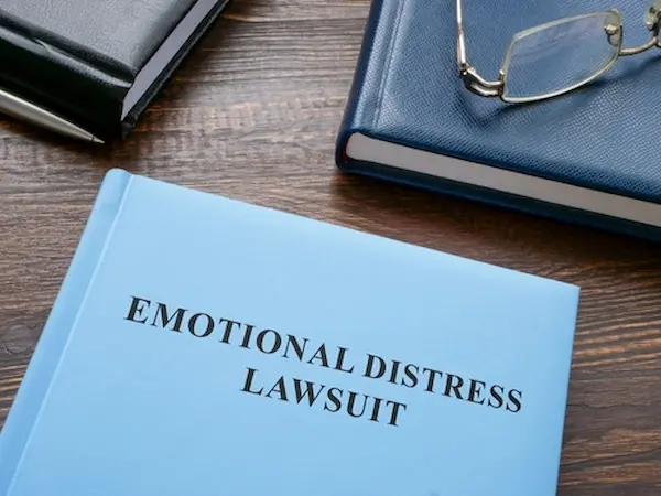 Emotional Distress Lawsuit Concept With Book