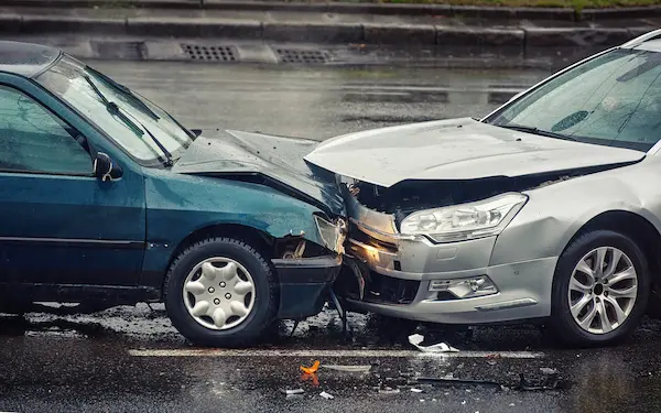 common causes of car accidents, head on collision in rainy weather
