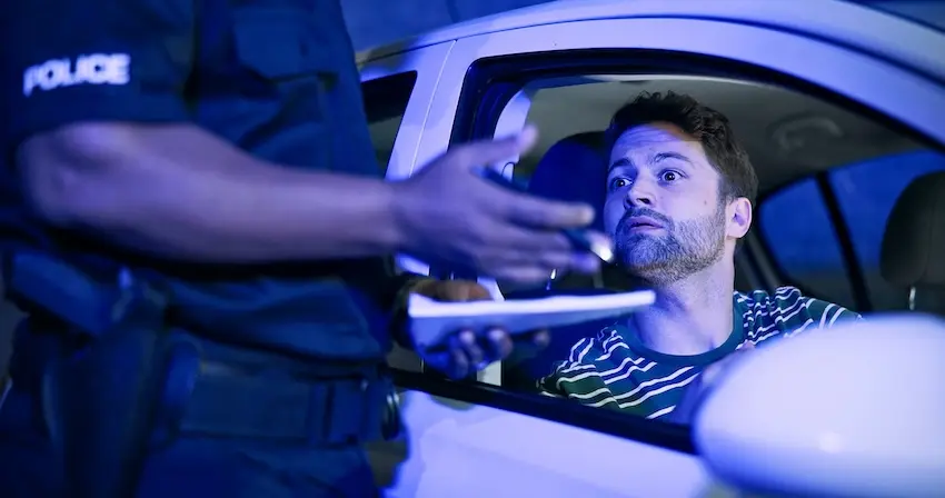 “Injured patient consulting with a doctor about accident-related neck and back pain”