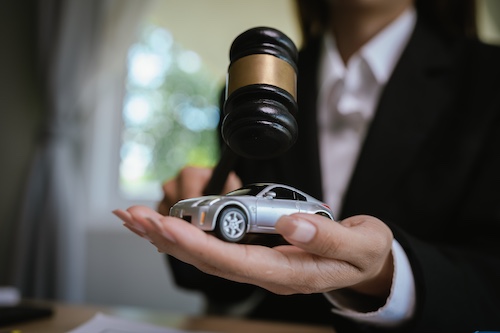 Car Accident Lawyer With Gavel and Toy Car - Local Car Accident Lawyers