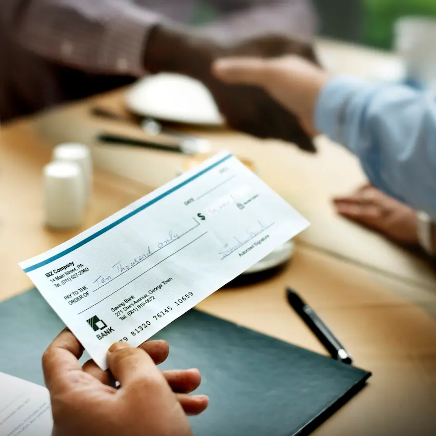 North Carolina car accident attorney meeting with client during free consultation to discuss contingency fee costs