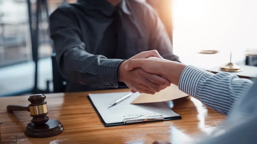 Car accident settlement check representing compensation recovered by North Carolina personal injury lawyer for client