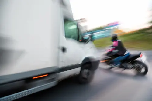 Vehicle About To Hit Motorcycle