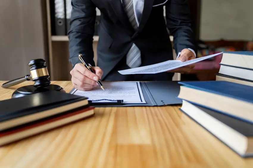 North Carolina car accident lawyer reviewing a client's case documents and medical records