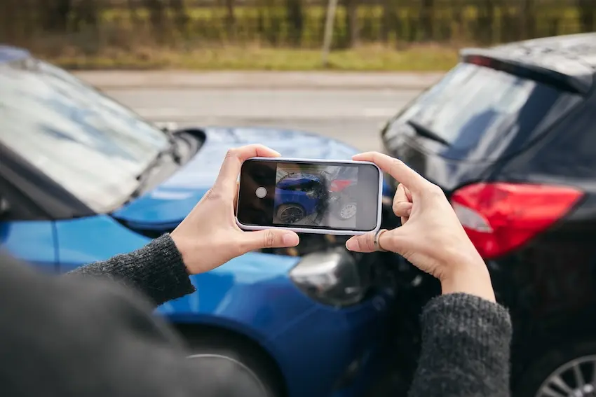 North Carolina car accident lawyer reviewing a client's case documents and medical records